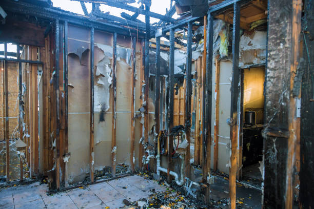 Professional Fire Damage Restoration technician working in Highland Park, TX
